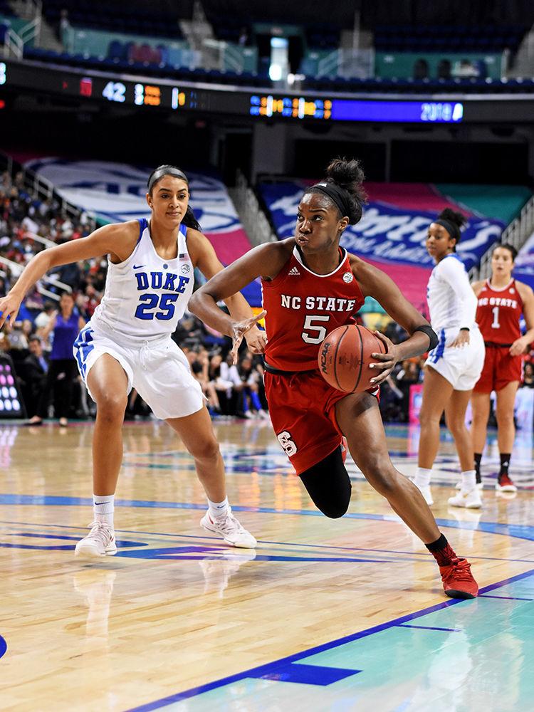 Senior forward Chelsea Nelson rushes the Blue Devil's defense at the ACC women's basketball quarterfinal against Duke University in Greensboro Coliseum on Friday, Mar. 2, 2018. Nelson set an ACC tournament record of 22 rebounds during the match. The Wolfpack won against the Blue Devils 51-45.