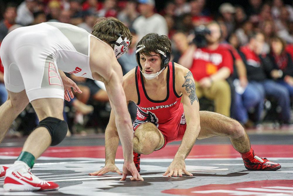 Senior Kevin Jack prepares to take on Ohio State's Joey McKenna on Feb. 18 in Reynolds Coliseum. Jack would lose 6-2 and State fell 29-6.