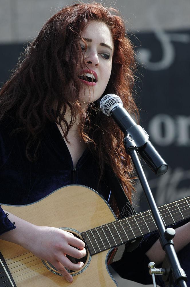Frances Mehlenbacher performs alongside her sister Elanor Mehlenbacher at the "March for Our Lives" in downtown Raleigh on Saturday, March. 24, 2017. The protest called for "common sense gun reform" in the wake of the multitude of mass shootings that have taken place in the United States school system.