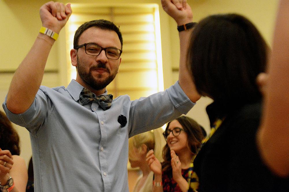 Semih Isik, a graduate student studying electrical engineering and the president of the Turkish Student Association, dances to live music at the Turkish Music and Dance Night. The TSA hosted the event on Saturday in the Mountain Ballroom in Talley Student Union.