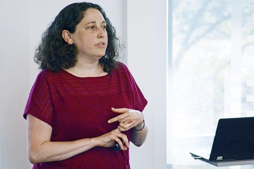 Dr. Marne Coit, a faculty member in the Department of Agricultural &amp; Resource Economics, speaks at the Industrial Hemp Grows In NC panel discussion on Friday, April 13 in Talley Student Union. Coit's lecture described how hemp laws and regulations are enacted and enforced at both the state and national level. Her talk contributed to the larger scope of the event, which was a discussion on North Carolina's emerging hemp industry.