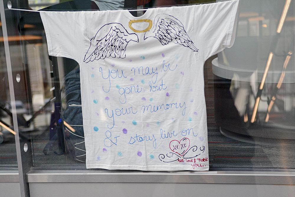 A t-shirt paying tribute to a victim of sexual assault hangs on display in Talley Student Union on Friday. The Clothesline Project featured many commemorative t-shirts to raise awareness about sexual assault.