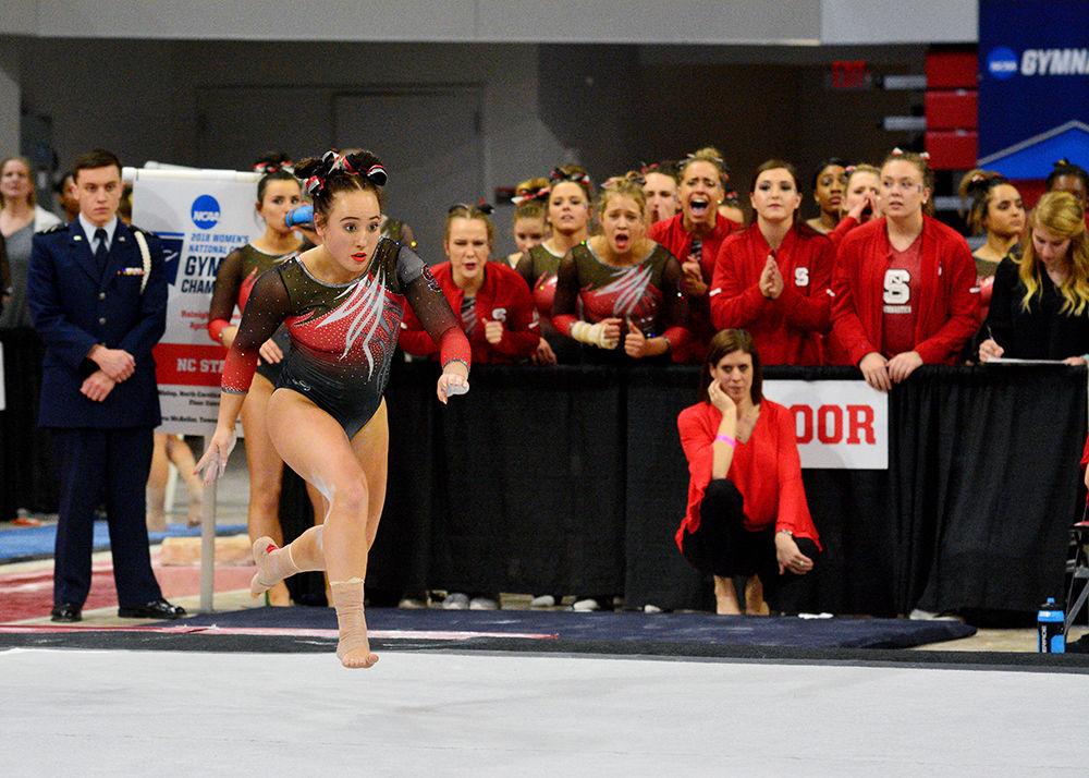 Sophomore Alexis Beucler gets a running start before tumbling in her floor routine in the NCAA Regional Championship in Reynolds Coliseum on Saturday. She scored 9.750 in this event.