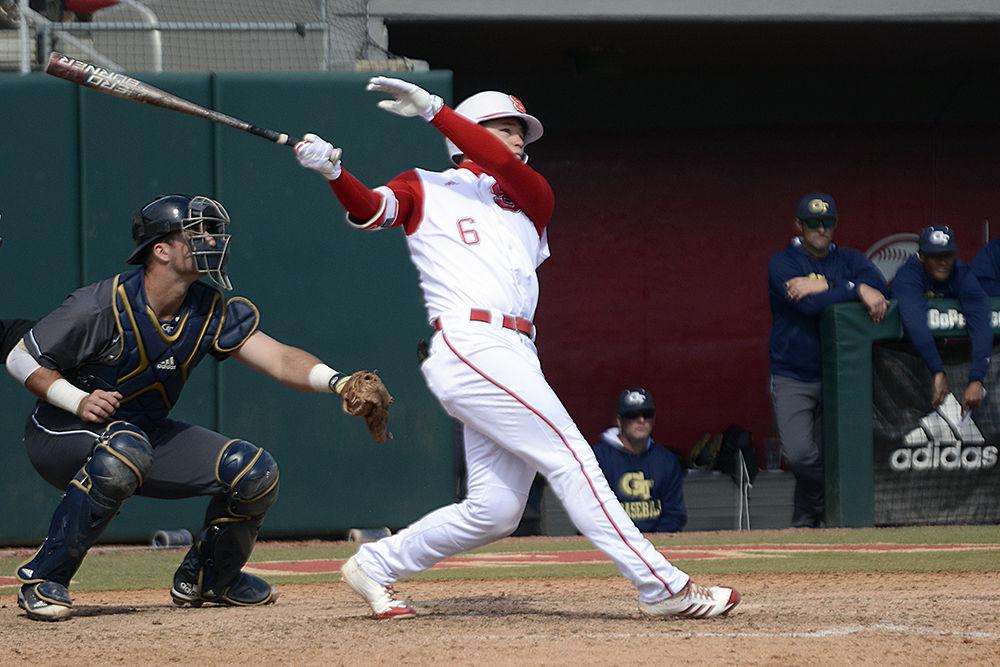 Junior outfielder Brett Kinneman hits a home run against Georgia Tech on Sunday, March 25 at Doak Field. Kinneman went 2-5 with one home run and 2 runs batted in as the Wolfpack won 9-6.