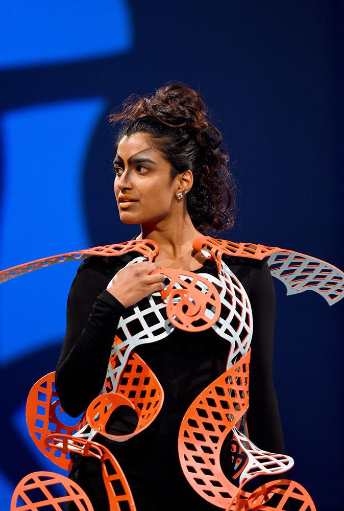 A model wears the design of fourth-year industrial design student Louis Bailey during the Art2Wear fashion show in the State Ballroom in Talley Student Union on Friday.