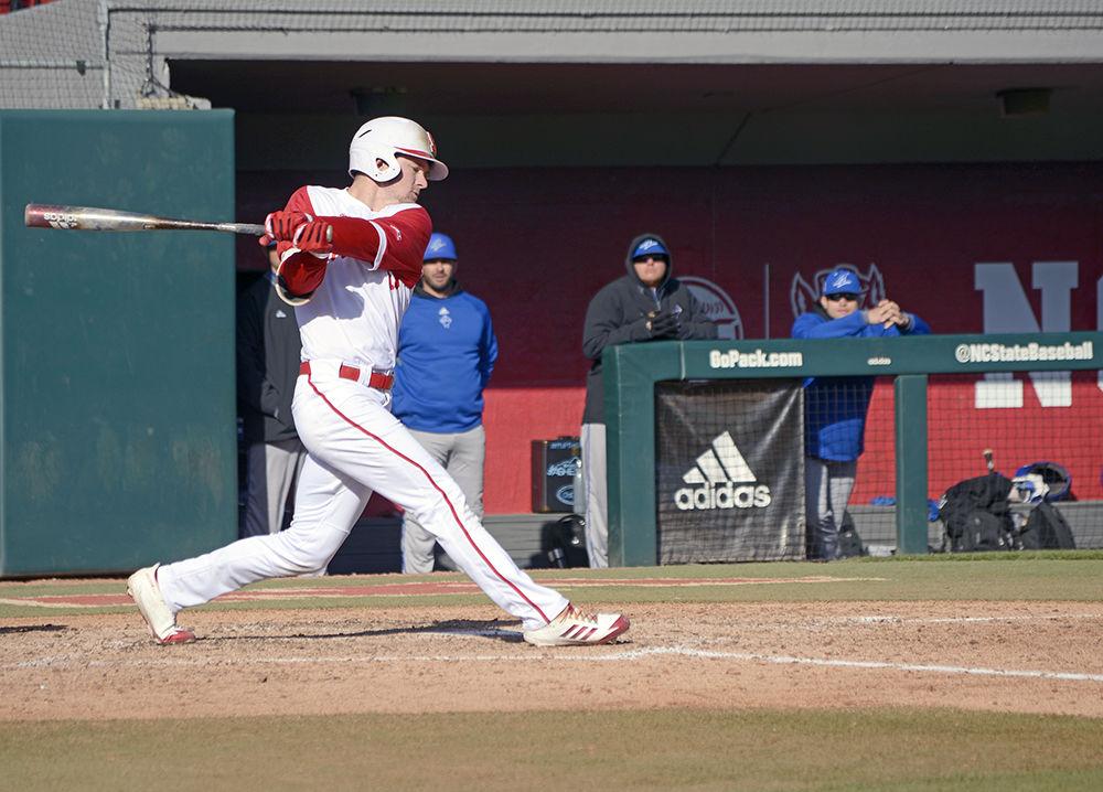 Senior outfielder Brock Deatherage swings at the ball during the game against UNC-Asheville on Wednesday, March 14 in Doak Field at Dail Park. The Wolfpack beat the Bulldogs 6-2 for its 15th win this season.