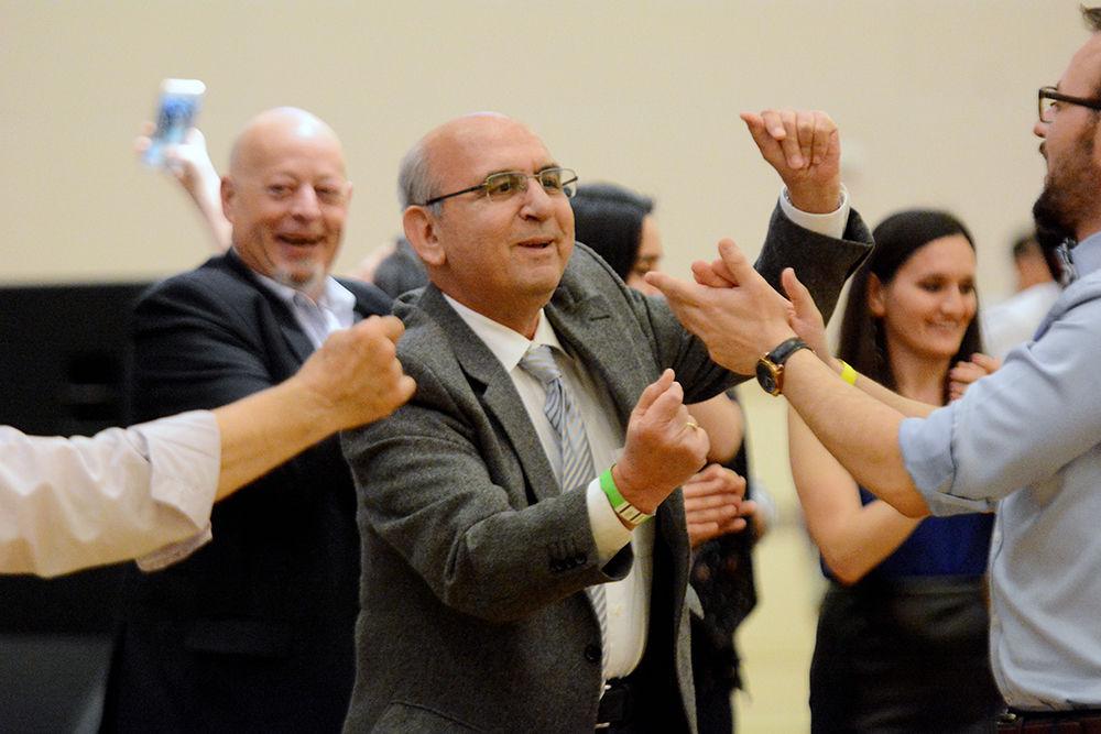 Aslan Soyarslan dances to Turkish music at the Turkish Music and Dance Night. Hosted by the Turkish Student Association, the Turkish Music and Dance Night was held on Saturday in the Mountain Ballroom in Talley Student Union.