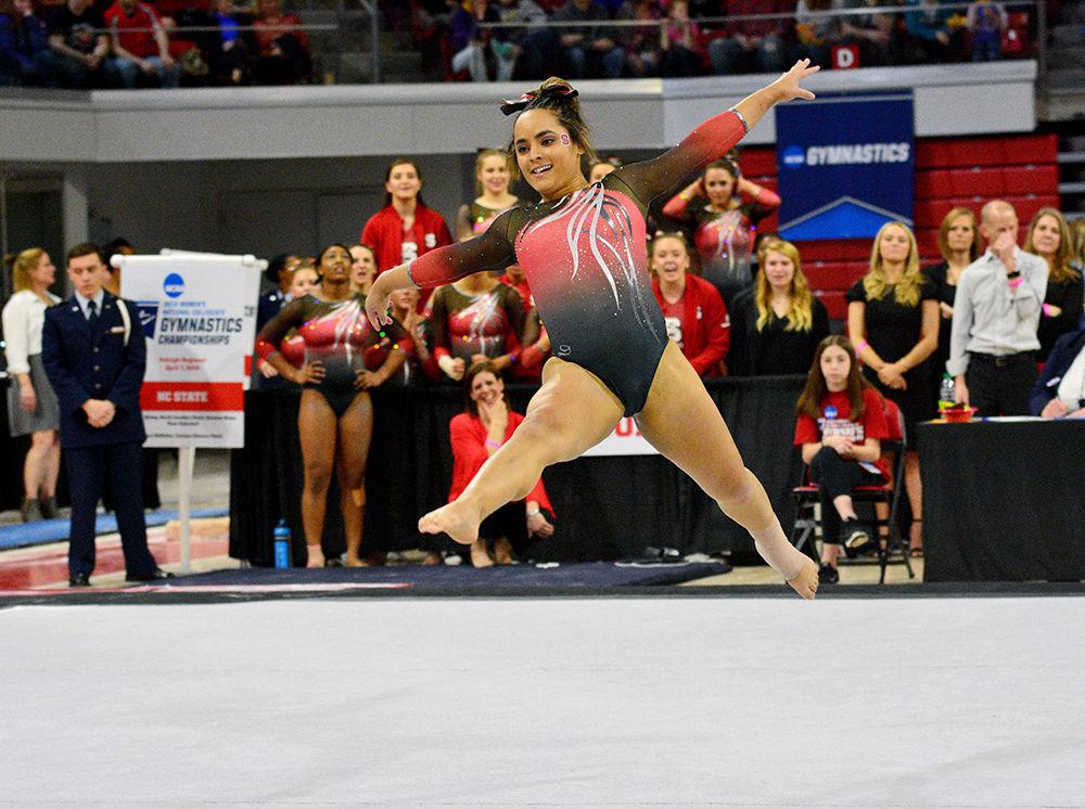 Sophomore Drew Grantham performs her floor routine at the NCAA Regional Championship in Reynolds Coliseum on Saturday. She scored 9.850 in this event.