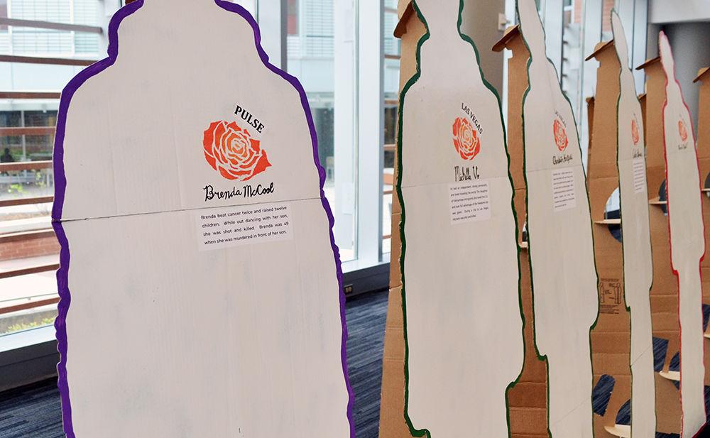 The "Know Their Names. Learn Their Stories." exhibit displays cardboard cutouts of victims of gun violence, along with their names and stories in Talley Student Union on Monday. The cutouts include the names of people from the incidents in Sandy Hook, Pulse and Las Vegas, among others. This event was hosted by the Center for Student Leadership, Ethics &amp; Public Service.