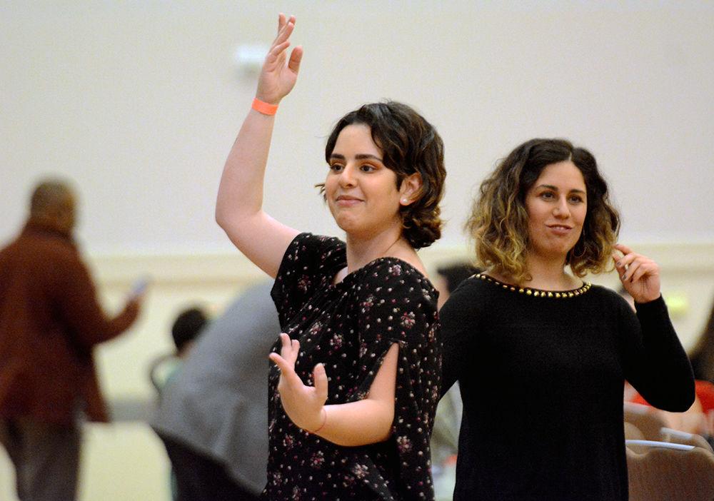 Senem Karabudak and Ezgi Yargici dance to popular Turkish songs at the Turkish Music and Dance Night. The event was hosted by the Turkish Student Association Saturday in Mountain Ballroom in Talley Student Union.