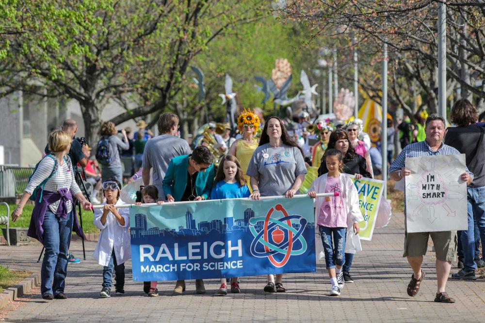 Kids help lead the Raleigh March for Science on Saturday around the Halifax Mall in downtown Raleigh. The March invited people to come and learn at various vendor and activity tables as well as listen to speakers and performers at the concluding rally.
