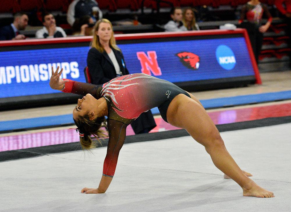 Sophomore Drew Grantham performs her floor routine at the NCAA Regional Championship in Reynolds Coliseum on Saturday. She scored 9.850 in this event.