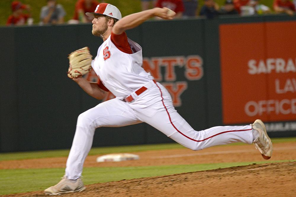 Sophomore pitcher Kent Klyman delivers a pitch against William &amp; Mary on Saturday at Doak Field. Klyman was the winning pitcher as he threw 1.2 innings, giving up 1 hit and striking out 3 as the Wolfpack won 8-4.