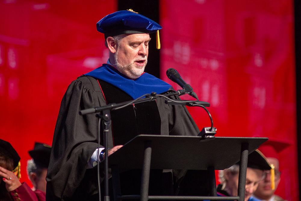 Dr. Peter Harries speaks about the graduate school during Spring Commencement on Saturday, May 12 in PNC Arena.