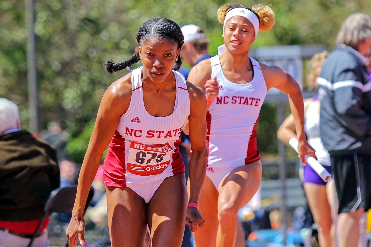 Junior Gabriele Cunningham passes the baton to redshirt senior Tiana Patillo for the third leg of the Women's 4x100. NC State took second place with 45.41, the third best time in school history at the Raleigh Relays on Saturday, March 31 at the Paul Derr Track and Field Facility.