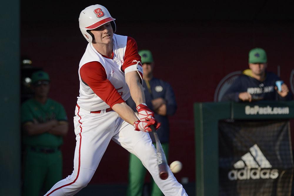 Freshman catcher Patrick Bailey hits the ball against Notre Dame on Friday, April 13 at Doak Field. Bailey went 2-4 with one double, one RBI and one run scored.