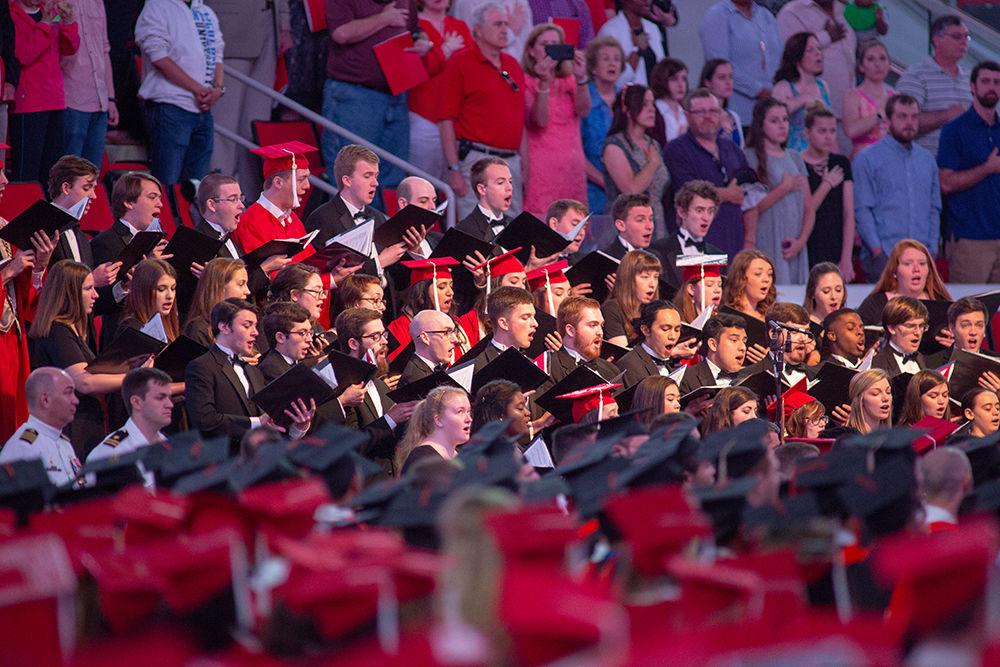 The State Chorale sings the National Anthem during Spring Commencement on Saturday, May 12 in PNC Arena.