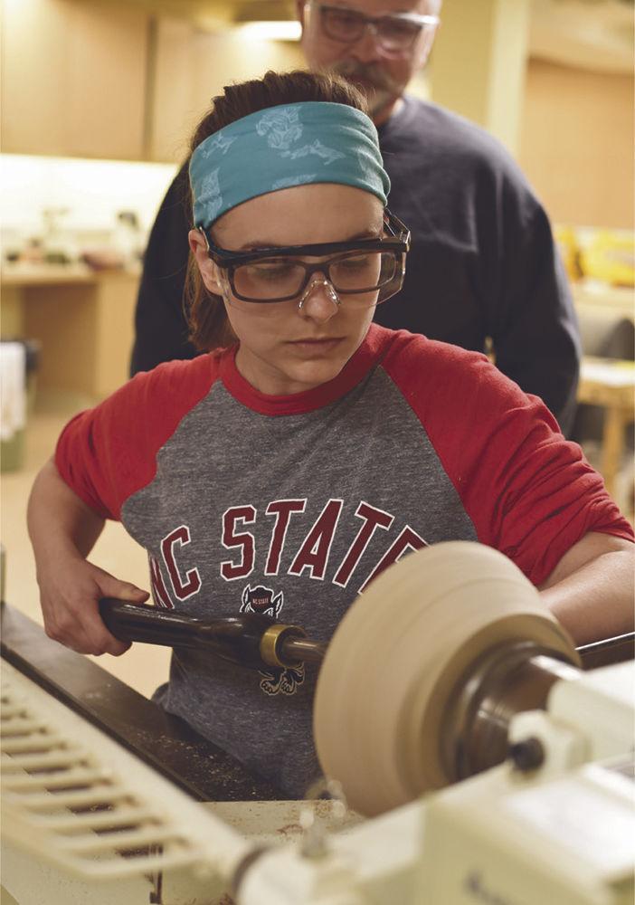 Students in the Crafts Center have access to a variety of tools they can use while working on projects, such as lathes for woodworking.
