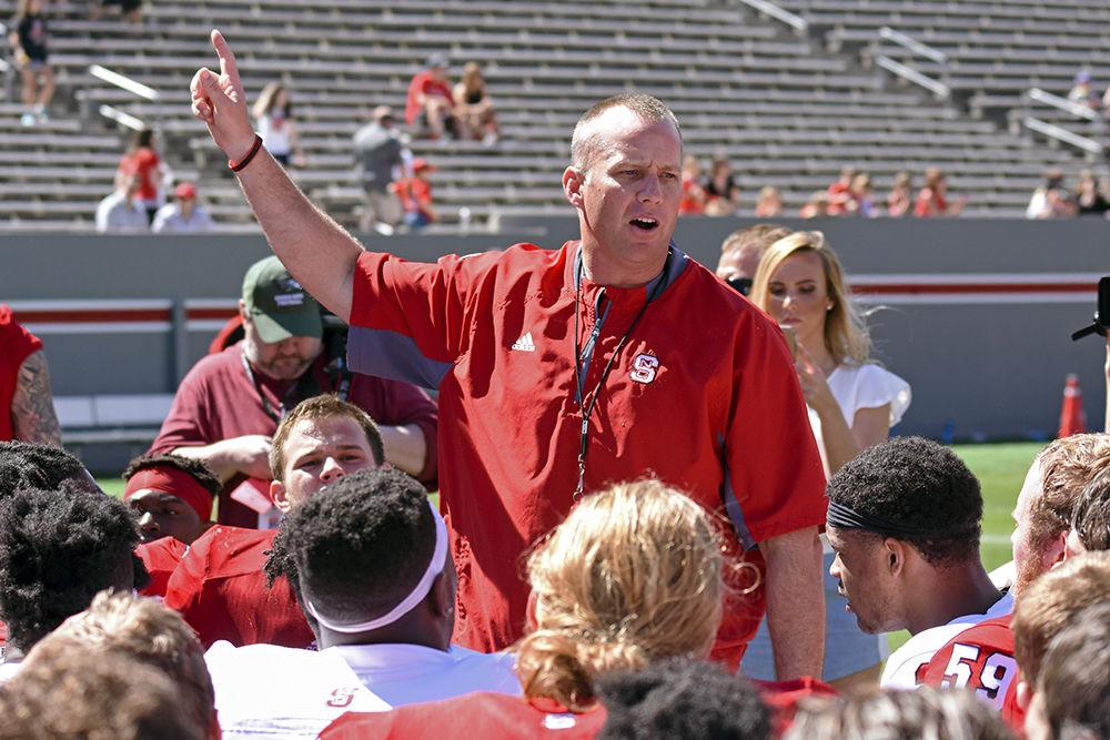Head coach Dave Doeren talks with his team following the Wolfpack's Kay Yow Spring Game on April 1, 2017 at Carter Finley Stadium. The format of this year's spring game was completely changed featuring scripted plays and no live tackling.