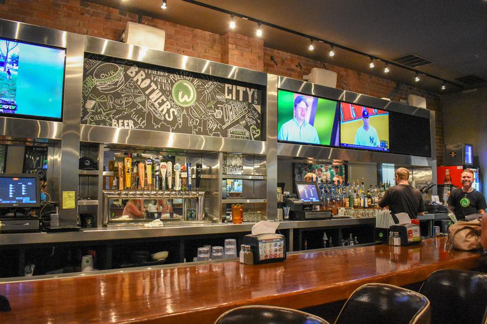 The bar area at the Wahlburgers restaurant on Thursday, June 14, 2018 in downtown Raleigh on Fayetteville Street. Wahlburgers had a soft opening on May 3 and is now open for business.