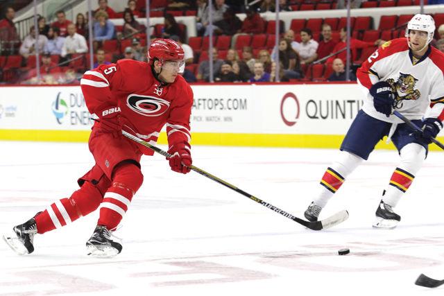 Hurricanes defenseman Noah Hanifin advances the puck against the Florida Panthers on Oct. 13 at PNC Arena. Hanifin was drafted fifth overall in the 2015 NHL Draft and played 79 games in his rookie year.&#160;