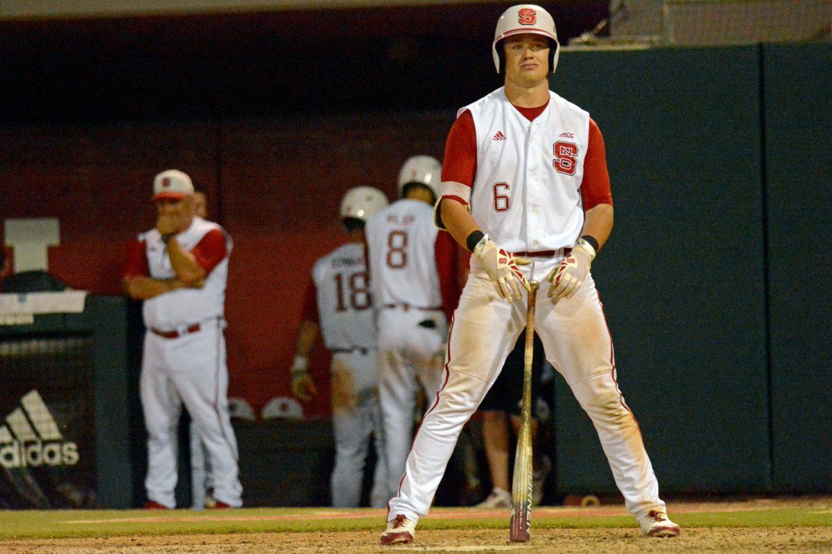 Junior outfielder Brett Kinneman strikes out against Auburn at Doak Field on Sunday. Kinneman went 0-4 with two strikeouts and one run scored as the Wolfpack lost 15-7.