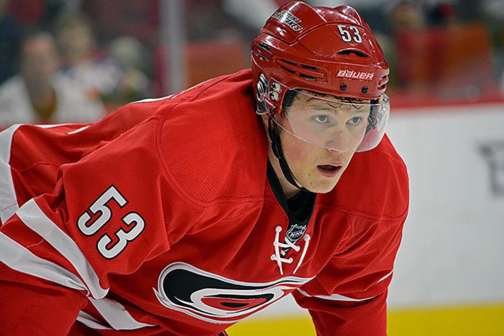 Jeff Skinner, Hurricanes left wing #53, watches the faceoff. Skinner had 7 shots on goal, and scored one point during the game. The New York Islanders defeated the Carolina Hurricanes at home in overtime, 4-3, at PNC Arena on Saturday, March 26, 2016.
