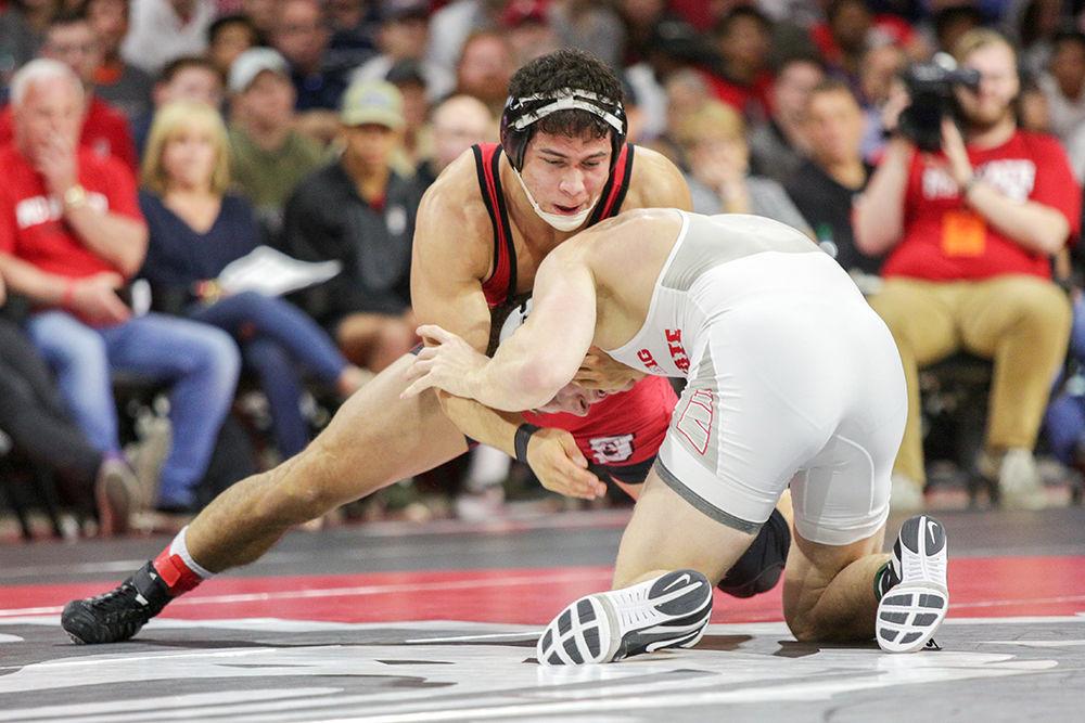 Redshirt senior Michael Macchiavello grapples with an opponent on Feb. 18 at Reynolds Coliseum. The Wolfpack lost 29-6 to No. 2 Ohio State.&#160;