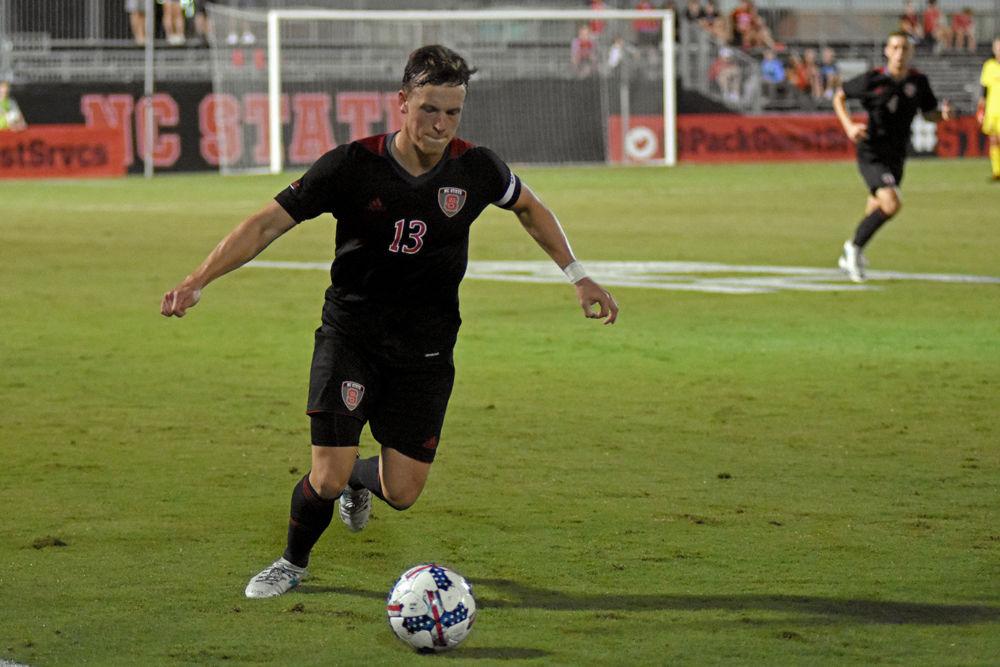 Junior defender Simon Blotko moves upfield during the game at Dail Soccer Stadium. The Wolfpack would go on to unseat #3 Clemson by a score of 1-0 on Friday, Sept. 8, 2017.