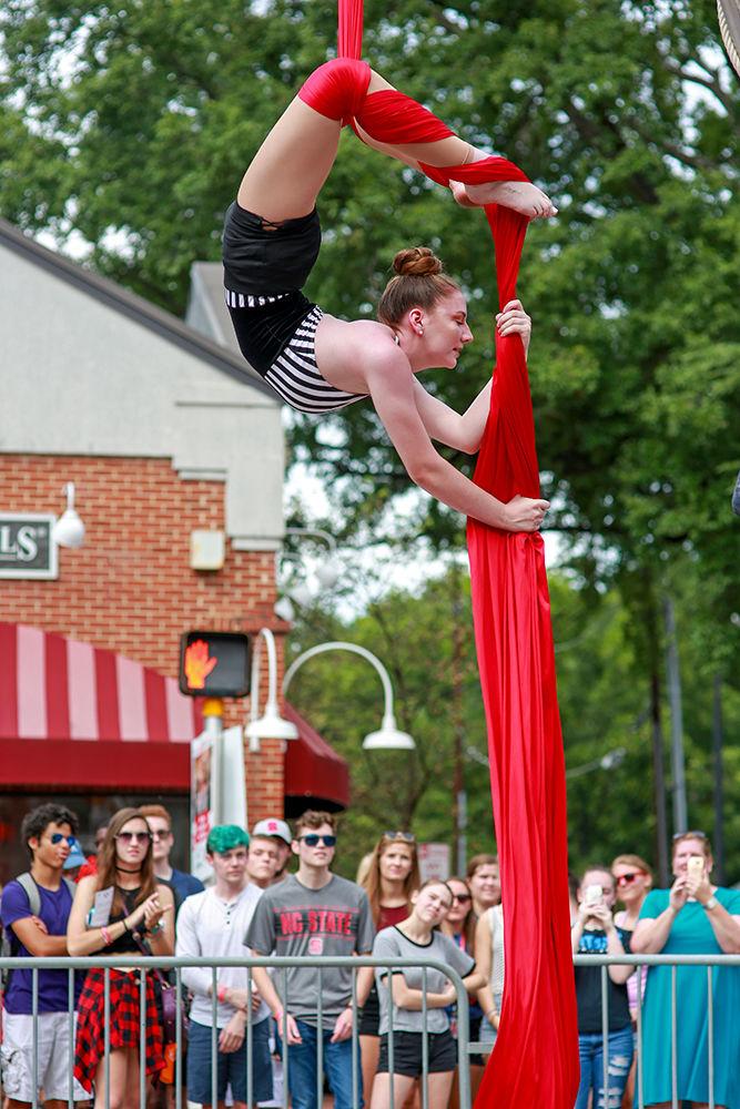 Annie Cunningham of Rolesville High School performs on the silks at Packapalooza on Saturday, August 25. Cunningham has put in three years on the silks and now performs with Cirque de Vol.