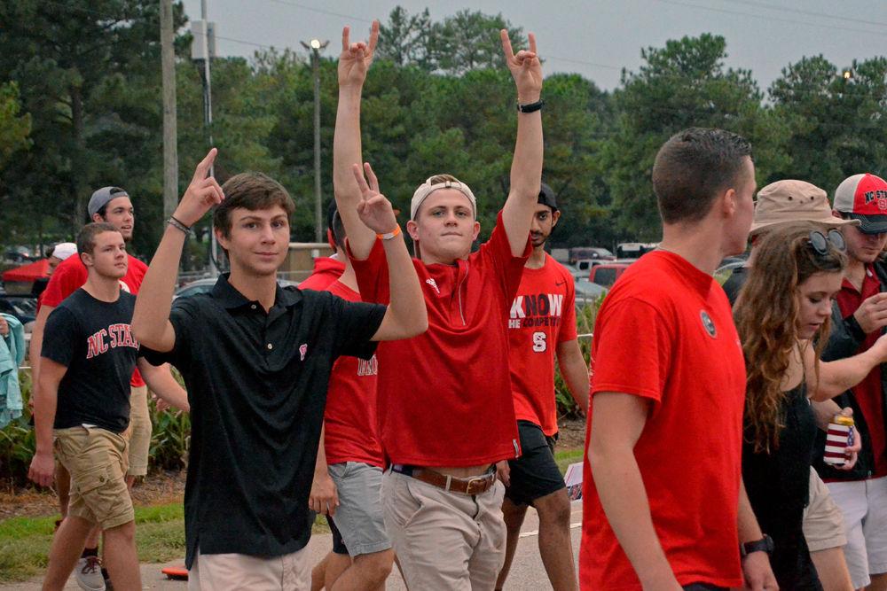 Students cross the street from the tailgate to the stadium prior to the Wolfpack's game versus William and Mary on Sept. 1, 2016. Some students had to stand in line for an estimated 45 minutes before entering the stadium. The NC State football team beat William and Mary 48-14.
