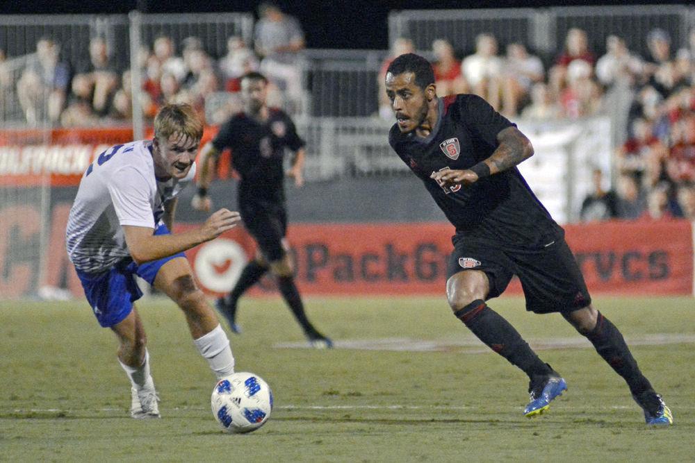 Junior midfielder Gabriel Machado dribbles past a Presbyterian defender at Dail Soccer Stadium on Friday, Aug. 31. The Wolfpack won 2-0.