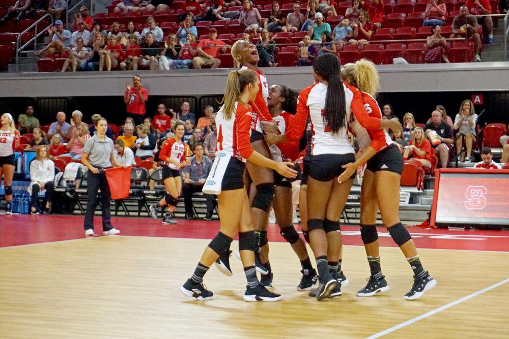 NC State Volleyball celebrates a point against Campbell on Sunday, Sept. 9 at Reynolds Coliseum. The Wolfpack won 3-0.