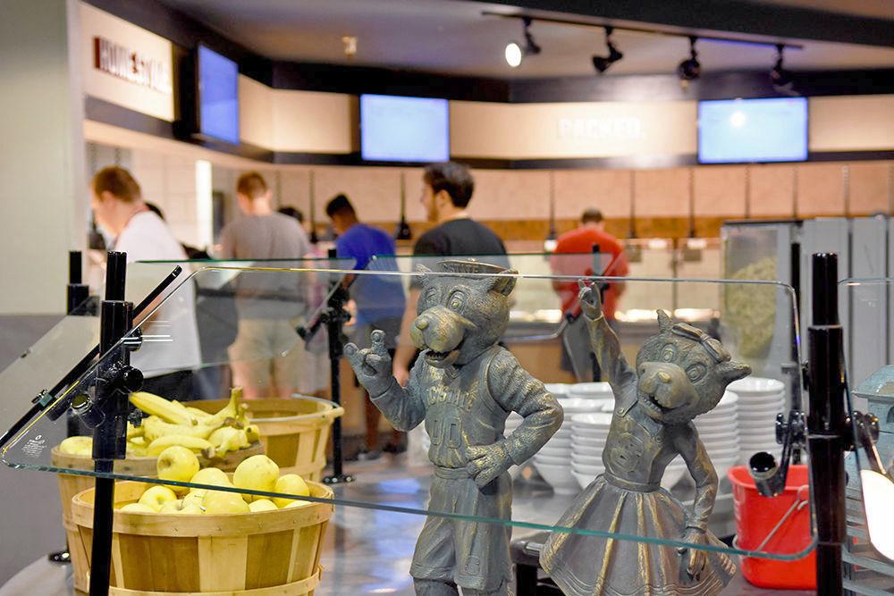 Mr. and Ms. Wuf stand as fixtures in Fountain Dining Hall, the largest dining hall on campus.