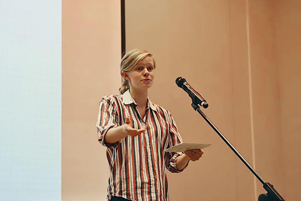 Natalie Sherwood, a junior majoring in polymer and color chemistry, recites her spoken word piece at the Technicmetric Poetry Slam in Talley Student Union on Thursday, Jan. 21, 2016. Sherwoods piece, which won her the grand prize for the competition, an Apple Watch, highlighted the struggles that people of color face in our society today. The purpose of the Slam was to "combine technical intelligence with creative genius," and give NC State students a chance to showcase their talents behind the mike.