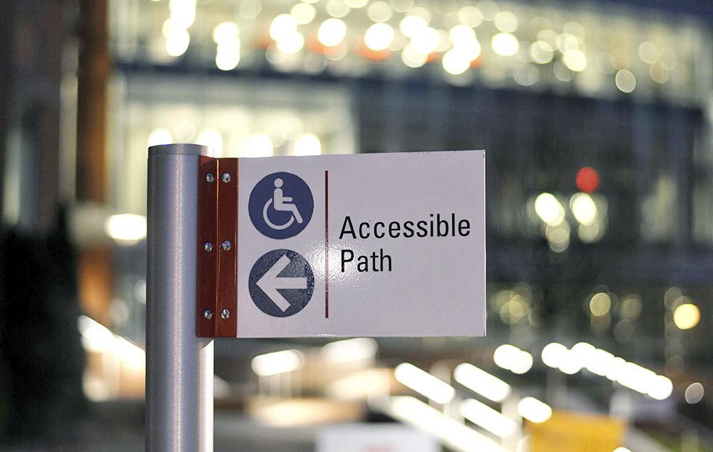 An accessibility sign stands in front of Talley Student Union on Wednesday, Feb. 28. These signs are important for showing people an alternative path to take to access major campus buildings.