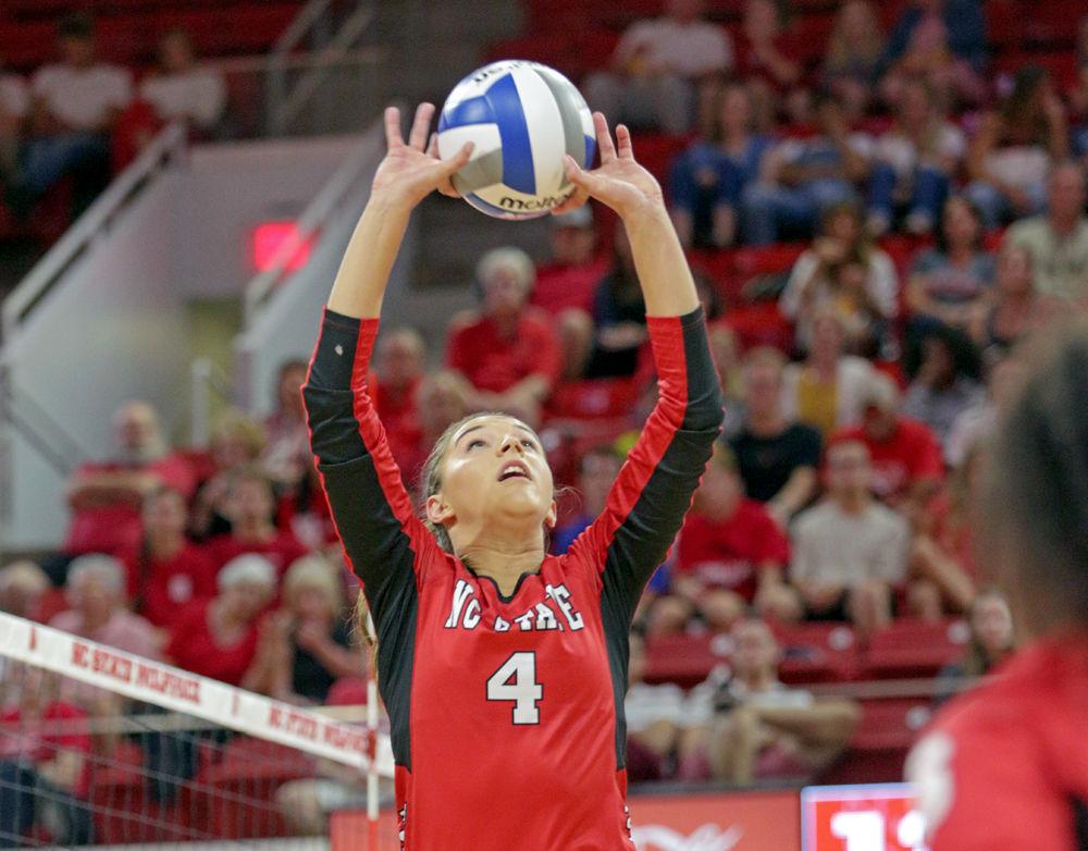 Senior setter Kylie Pickrell sets the ball. The Wolfpack were able to pull out a 3-2 win over Virginia Commonwealth University on Friday, Aug. 24 in Reynolds Coliseum.