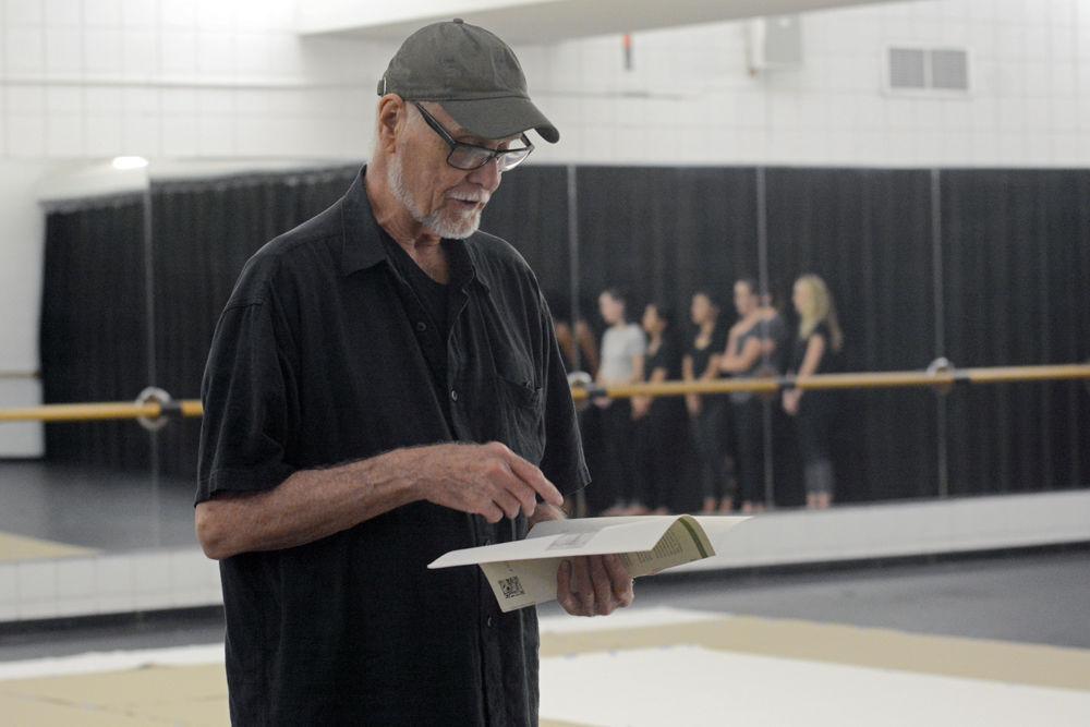 Ray Kass, an artist and the founder of Mountain Lake Workshop, explains the background of the Master Class performance of "John Cage's STEPS: A Composition For A Painting" in Carmichael Gymnasium on Wednesday, Sept. 19. Kass talked about how the first performance of the work was completed by John Cage in the Mountain Lake Workshop in 1989, later stating that the artist saw it as a representation of "the solitary individual passing through life".