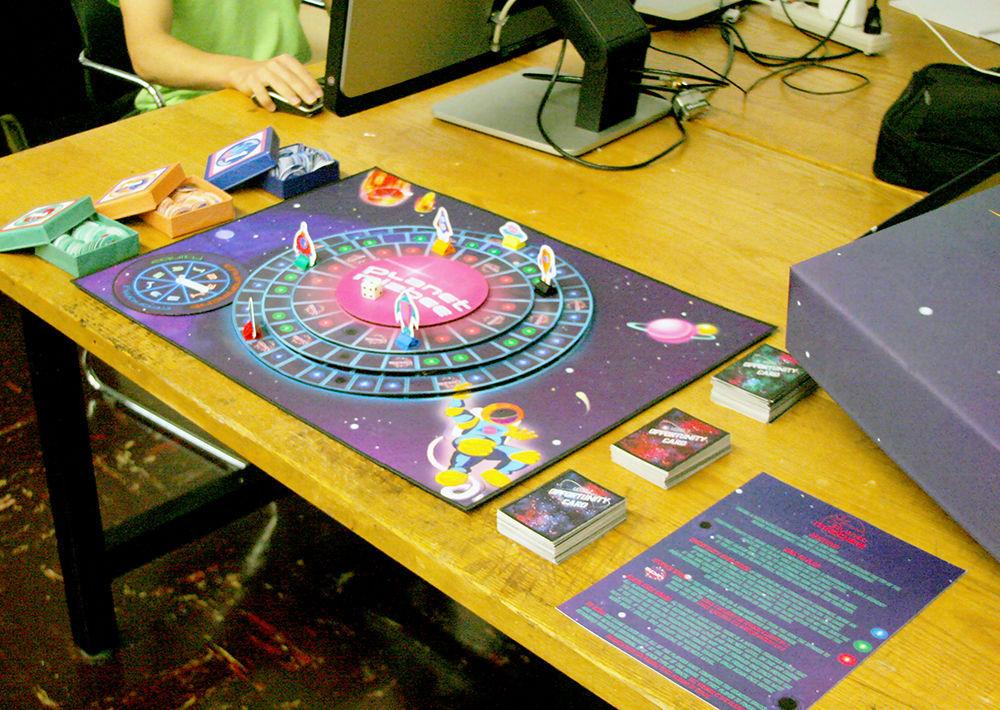 Planet Mizbee, a game created by Art &amp; Design Assistant Professor Emil Polyak, challenges his students to design board games to teach the ideas of sustainability to children. The Game Club plays board games at their meetings.
