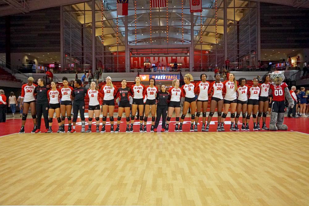 NC State Volleyball sways together at the end of the 3-0 win over Cambell on Sunday, Sept. 9 at Reynolds Coliseum.