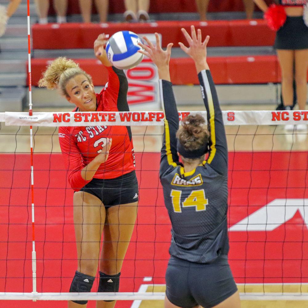 Sophomore outside hitter Melissa Evans goes for the kill. Evans lead the team with 18 kills. The Wolfpack were able to pull out a 3-2 win over Virginia Commonwealth University on Friday, Aug. 24 at Reynolds Coliseum.