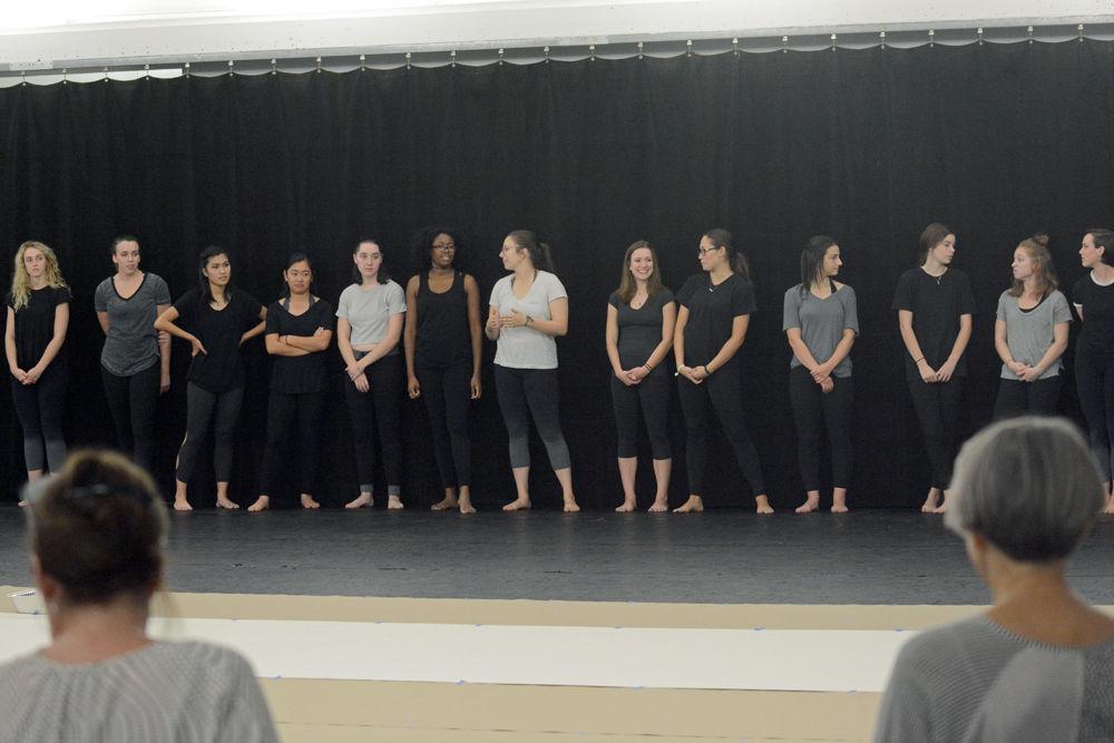 Members of the NCSU Dance Company wait to begin their performance of "John Cage's STEPS: A Composition For A Painting" for a Master Class in Carmichael Gymnasium on Wednesday, Sept. 19. The Master Class Series, put on by the NC State Dance Program, offers free dance instruction to NC State students, staff, and faculty.