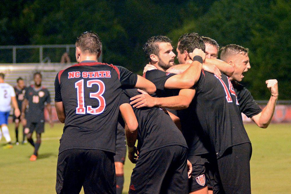 The NC State men's soccer team celebrates a goal at the game against Presbyterian on Friday, August 31, 2018 at Dail Soccer Stadium. The Wolfpack beat Presbyterian 2-0.