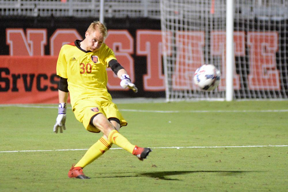 Freshman goalkeeper Leon Krapf kicks the ball upfield during the game against the Virginia Cavaliers. The Wolfpack tied the Cavaliers 0-0 in Dail Soccer Stadium on Oct. 13, 2017.
&#160;