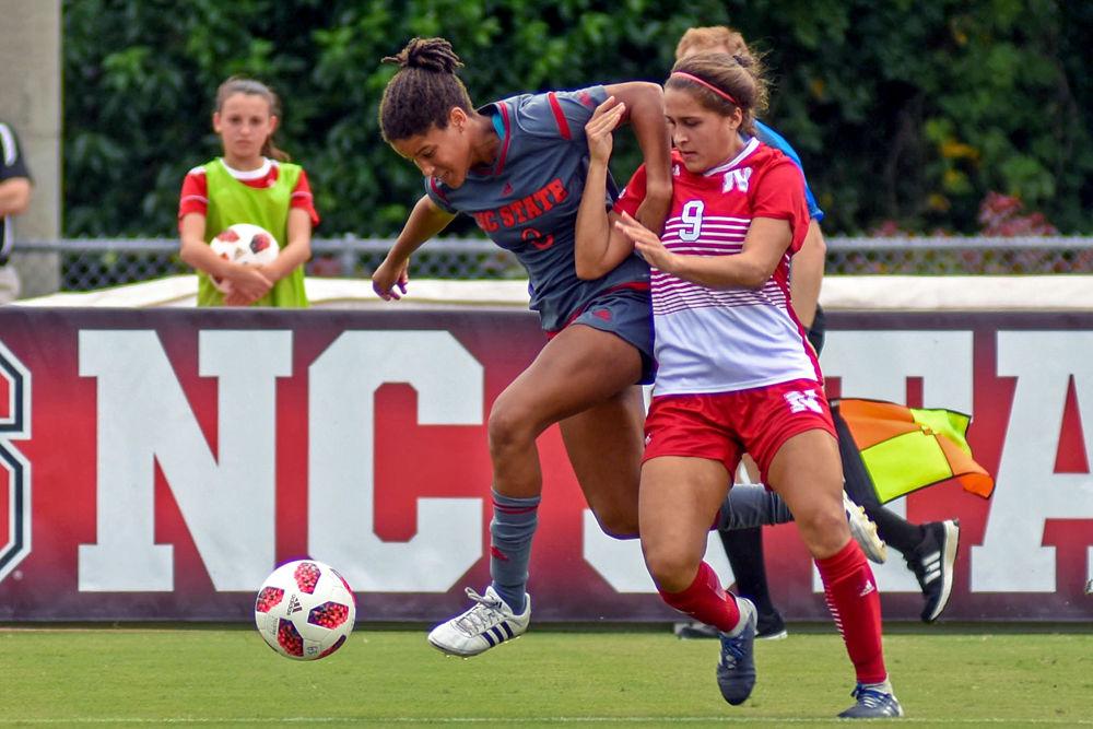 Junior forward Kia Rankin fights for the ball with a Nebraska defender on Sunday, Sept. 9 in Dail Soccer Stadium. Rankin had 5 shots in the game as the Wolfpack lost 2-1.
