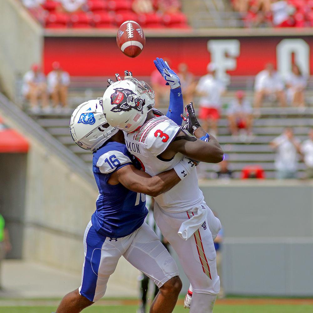 Junior wide receiver Kevin Harmon goes up for the catch, but is unable to pull it in. Harmon had a team-high 129 yards through the air during the 41-7 win over Georgia State on Saturday, Sept. 8 in Carter-Finley Stadium.