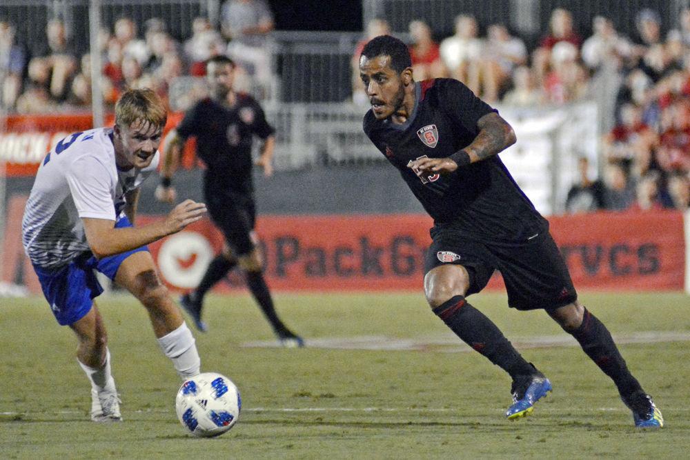 Junior midfielder Gabriel Machado gears up for a shot at Dail Soccer Stadium on Friday Aug. 31. The Wolfpack won 2-0 against Presbyterian.