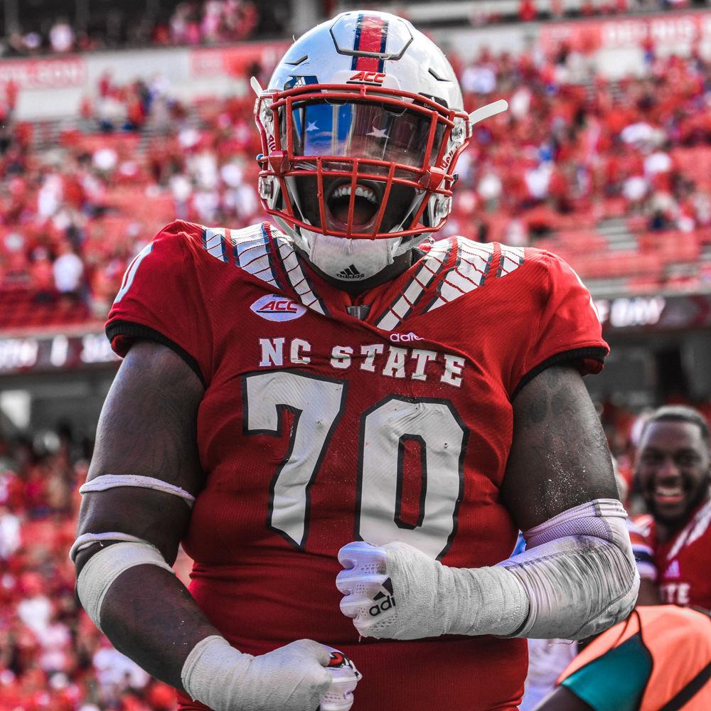 Redshirt senior offensive guard Terronne Prescod yells in victory after the Wolfpack's 35-21 victory over Virginia on Saturday, Sept. 29 at Carter-Finley Stadium. Prescod and the offensive line helped NC State to a season high of 176 yards rushing.