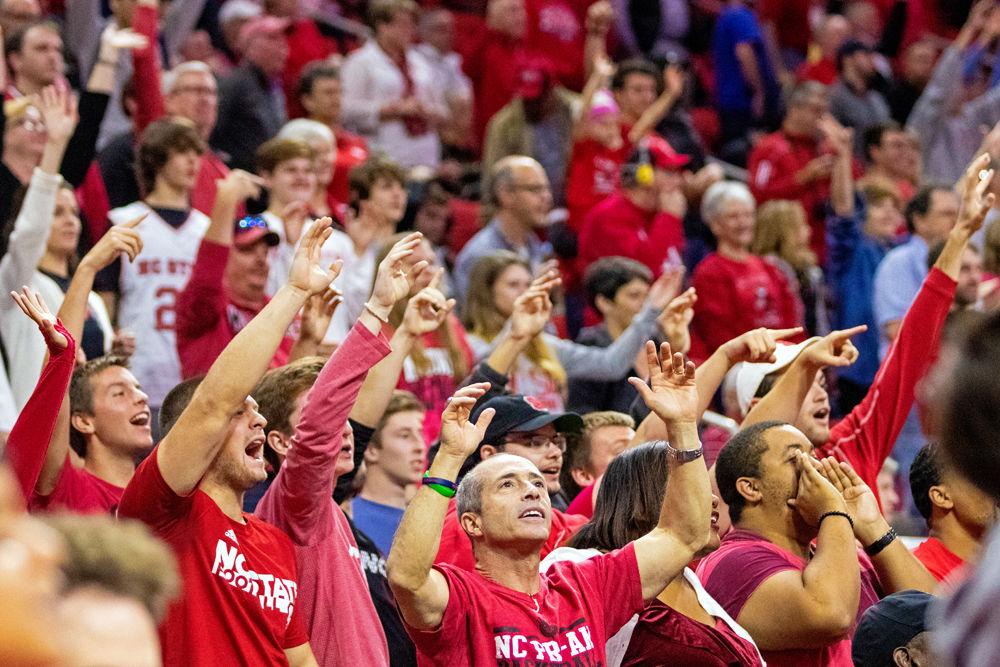 Fans get excited between whistles in PNC Arena on Monday, Oct. 29 at PNC Arena. The Wolfpack beat Chowan 111-62.