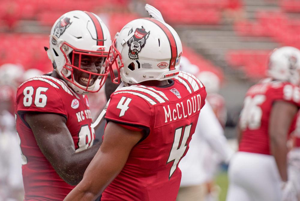 Sophomore wide receiver Emeka Emezie and junior cornerback Nick McCloud get energized before facing Boston College at Carter-Finley Stadium on Saturday, Oct. 6. The Wolfpack won 28-23.